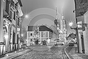 Christmas cityscape, black-and-white - evening view of the Monument Saint John of Nepomuk and the Cathedral of St. John the Baptis photo