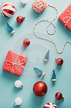 Christmas classic decorations and gift boxes on blue background. Vintage style. Flat lay, top view