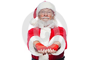 Christmas. Close up of two fists of Santa Claus with a red bandage wound on them for boxing. Kickboxing, boxing, karate