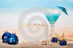 Christmas cocktail with umbrella and starfish