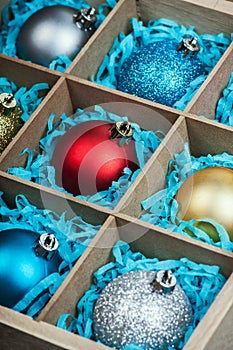 Christmas colored balls in a wooden box