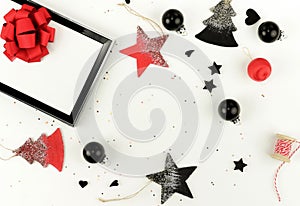 Christmas composition background from black and red Christmas decorations