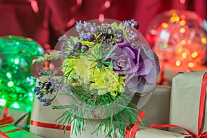 Christmas composition with bouquet and gift boxes