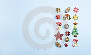 Christmas composition. Christmas gifts, decor, toys on a light blue background. Flat lay, top view. Banner with copy space
