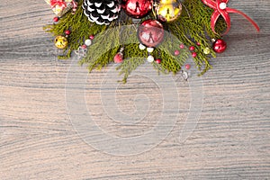 Christmas composition for christmas time. fir branches and christmas decorations on wooden background. flat lay top view.