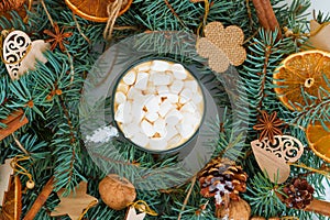 christmas composition cocoa glass glass with marshmallow side garlands snow fir branches