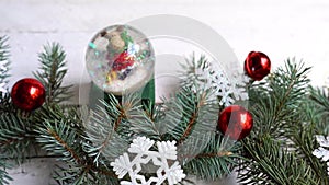 Christmas composition. decor, fir tree branches, red decorations on white background. winter, new year concept