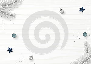 Christmas composition decorated with Christmas balls, stars, gray fir tree, and confetti isolated on white wooden background.