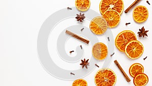 Christmas composition with dried oranges and spices on white background. Natural food ingredient for cooking or Christmas decor