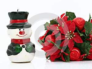 Christmas composition,flowers and a small snowman