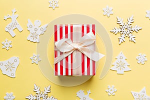 Christmas composition. Gifts box with new year decorations on colored background. Christmas, winter, new year concept