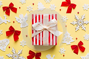 Christmas composition. Gifts box with new year decorations on colored background. Christmas, winter, new year concept
