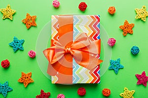 Christmas composition. Gifts box with new year decorations on colored background. Christmas, winter, new year concept