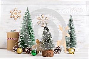 Christmas composition. Gifts, small tree, branches and craft DIY decorations on white background. New year concept