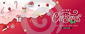 Christmas composition in paper cut style sale banner background.Merry Christmas text Calligraphic Lettering Vector illustration