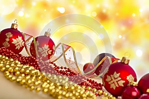 Christmas Composition. Red Baubles, Ribbons On Holiday Lights Background.