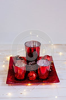 Christmas composition red colors on table.