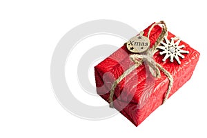 Christmas composition. Red Gifts box, wooden Christmas decorations on white background. Christmas, winter, new year concept. Flat