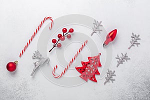 Christmas composition with red and silver gifts on stone background. Xmas holiday 2021 celebration. Flat lay, top view, copy space