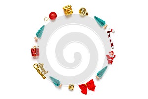 Christmas composition Round Christmas wreath made of golden, red, green decorations, fir tree isolated on white background Flat