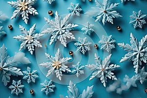 Christmas composition of snowflakes, decorations on blue background. Christmas, winter, new year concept. Flat lay, top view, copy