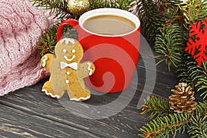 Christmas composition on vintage wooden table background - Cup of hot cocoa with gingerbread cookie