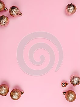 Christmas composition. White Gold decorations on pastel pink background. Christmas, winter, new year concept. Flat lay