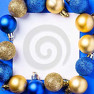 Christmas composition with white square copy space. Colorful ornament and baubles decorations