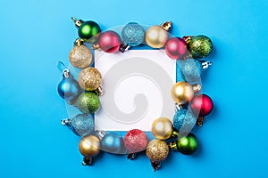 Christmas composition with white square copy space. Colorful ornament and baubles decorations