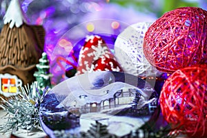 Christmas composition on wooden background with Christmas balls and green branch Christmas tree with pine cones,burning candle