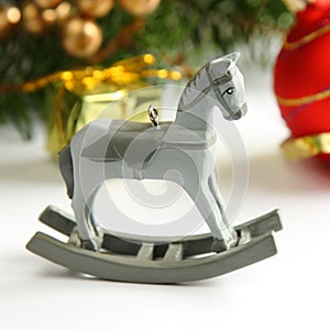 Christmas composition with wooden toy rocking horse