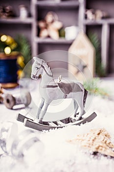 Christmas composition with wooden toy rocking horse