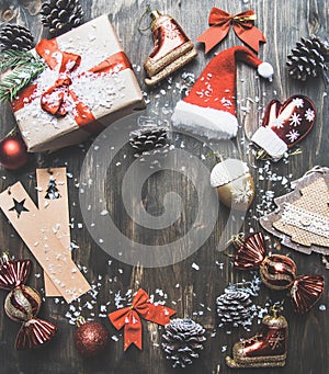Christmas concept, Christmas decorations. gifts and snow on a gray background, space for text