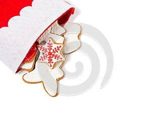 Christmas concept. Christmas sock with gingerbread on white back