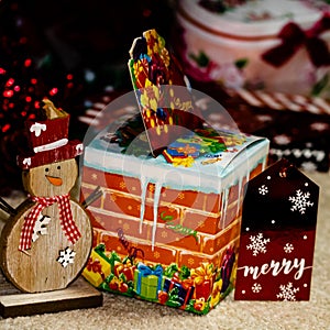 Christmas concept. Elements of Christmas decorations at home close-up. Christmas gifts under the tree