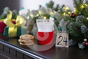 Christmas concept with milk and cookies for Santa. Advent calendar and Christmas traditions