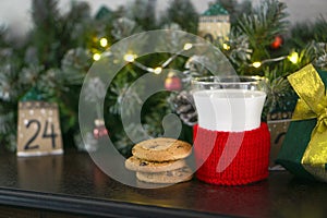 Christmas concept with milk and cookies for Santa. Advent calendar and Christmas traditions