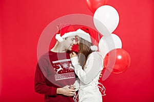 Christmas concept - Portrait of a romantic young couple with chr
