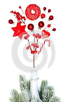 Christmas concept with Sparkling wine bottle and red Xmas decorations isolated on white background