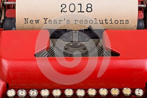 Christmas concept - typewriter with the text & x22;2018 New Year& x27;s resolutions& x22;. Close up