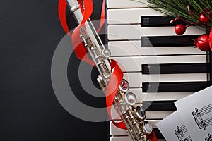 Christmas concert with piano and transverse flute close up