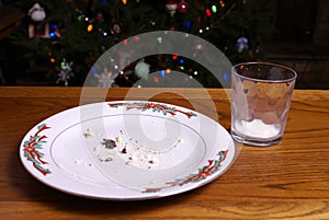 Christmas Cookie Crumbs and Empty Milk Glass photo