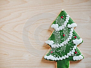 Christmas cookie X mas tree on wooden background Holiday festival