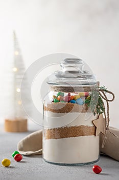 Christmas cookie mix jar. Dry ingredients for making cookies with color candies.