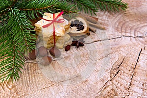 Christmas cookies and decoration on wooden background.