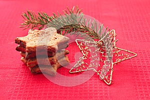Christmas cookies and decorations on red background