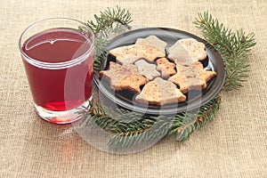 Christmas cookies and drink on a linen background