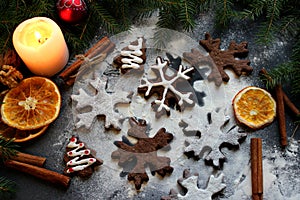 Christmas cookies in the form of flakes and Christmas trees, decorated with dried orange, spices and dusted with flour. Food. Back