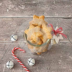 Christmas Cookies in Glass Jar with Candy Cane and Jingle Bells