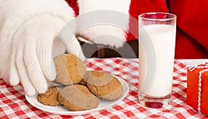 Christmas cookies and glass of milk preparing for Santa